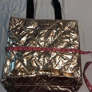 Victoria’s Secret tote golden copper medium size New without tag.  Ready to go!